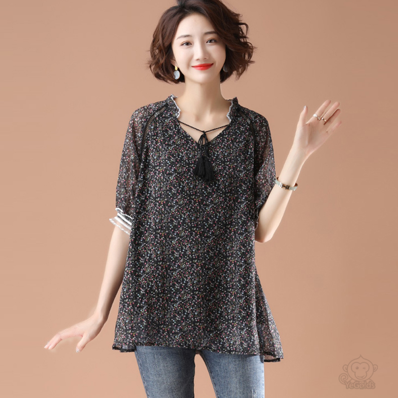 プラスサイズのフリンジトップ