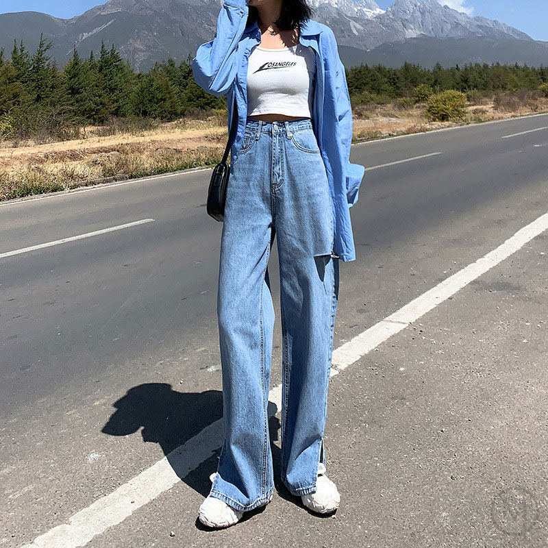 高層の破れたドレープジーンズ